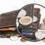 wallet, coins, magnifying glass
